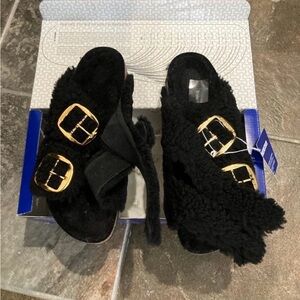 Birkenstock Black Faux-Shearling Slide Mules with Gold Buckles